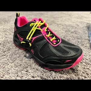 Black and pink water shoes.
